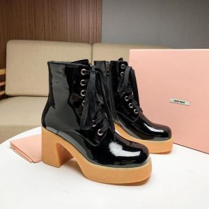 Miu Miu Patent Leather Booties mmbin0561028 Black